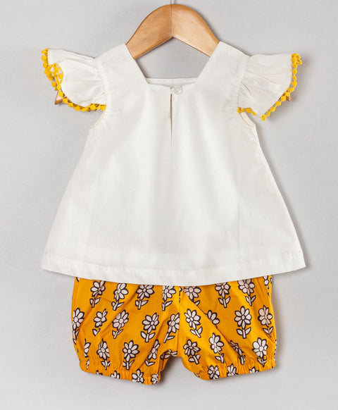 Infant coordinate set with embroidered flowers on the top n floral print shorts-White/ Yellow