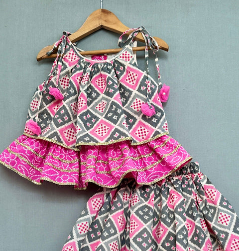 Pre-Order: Bandhani And Checks Printed Tie Up Strap Top And Lehenga