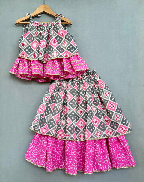 Pre-Order: Bandhani And Checks Printed Tie Up Strap Top And Lehenga