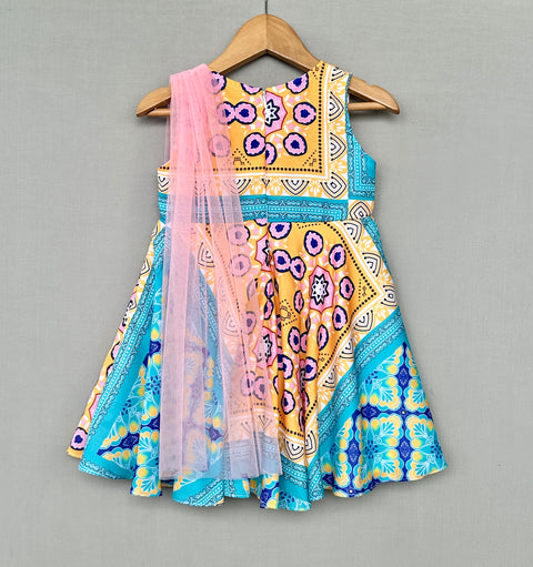 Pre-Order: Vibrant Geometric Print Attached Dupatta Dress for Girls