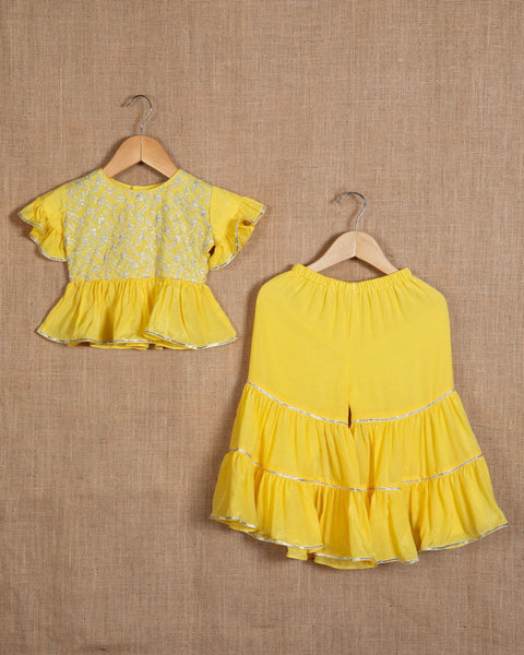 Pre-Order: Yellow Top with Silver Embroidery Paired with Sharara with Gota Lace work