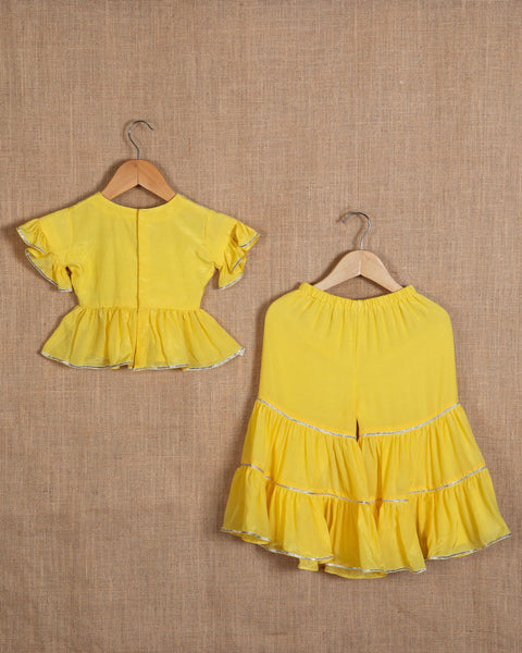 Pre-Order: Yellow Top with Silver Embroidery Paired with Sharara with Gota Lace work