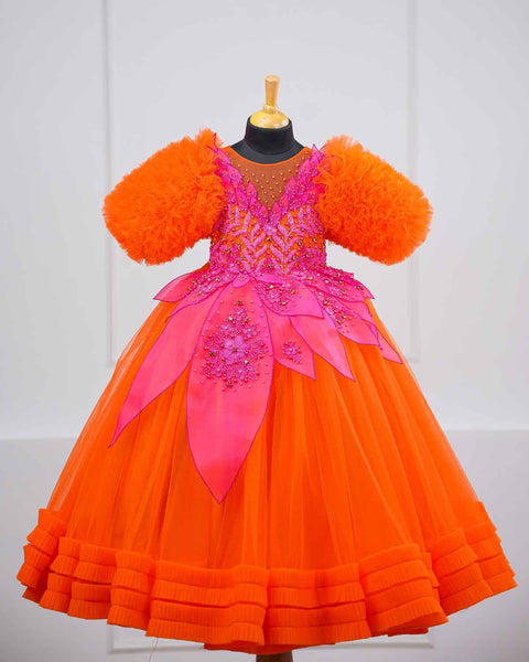 Pre-Order: Orange and fuchsia pink party wear gown with heavy and crafted yoke and petal detailing