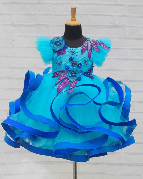 Pre-Order: Aqua blue and Royal blue twirled gown with purple and blue handcrafted flowers and detailing