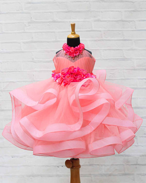 Pre-Order: Peach halter neck twirled couture gown with coral pink flower embellishments