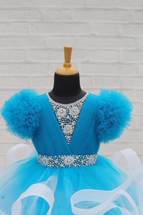 Pre-Order: Sea blue and white twirled gown with rich white bead work gown