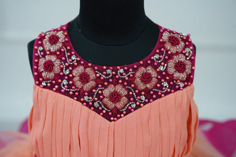 Pre-Order:  Peach And Dark Pink Double Shaded Twirled Partywear Gown with Hand worked Yoke