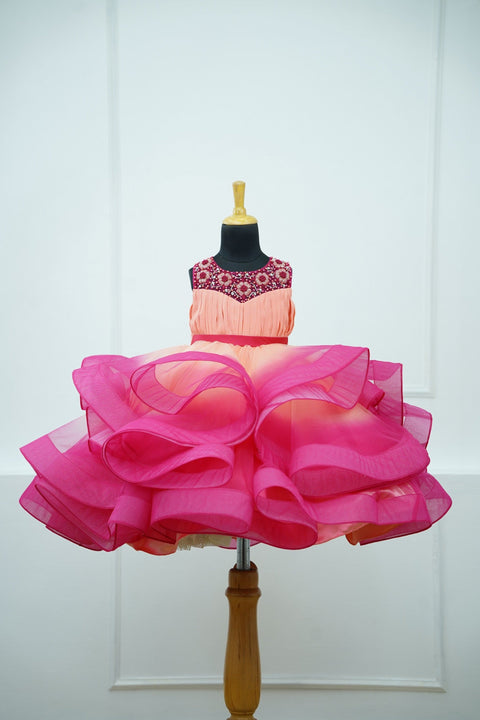 Pre-Order:  Peach And Dark Pink Double Shaded Twirled Partywear Gown with Hand worked Yoke