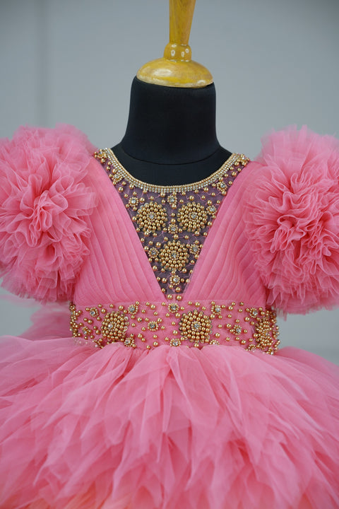 Pre-Order:  Flamingo Pink And Light Peach Feather Frilled Gown With Rich Golden Bead Work Gown