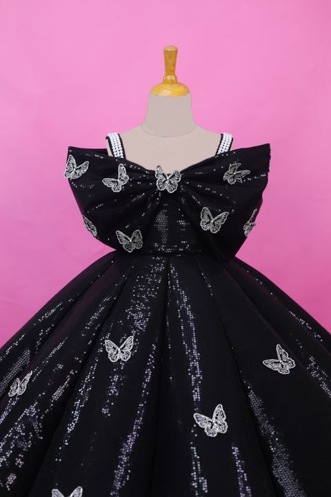 Pre-Order: Black SEQUENCE Panel Gown Highlighted with Handcrafted Silver Butterfly Patches.
