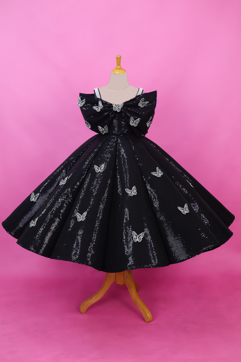 Pre-Order: Black SEQUENCE Panel Gown Highlighted with Handcrafted Silver Butterfly Patches.