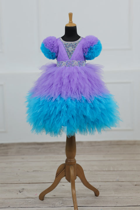 Pre-Order: Lavender & Sky Blue  Feather Frilled Gown With Rich Golden Bead Work Gown