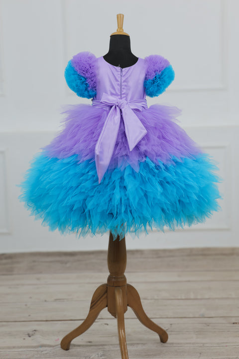 Pre-Order: Lavender & Sky Blue  Feather Frilled Gown With Rich Golden Bead Work Gown