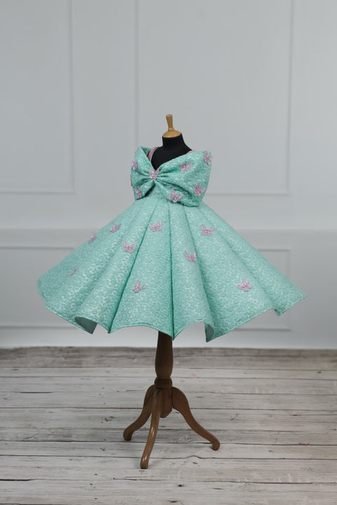 Pre-Order: AQUA Marine Blue Panel Gown Highlighted with Handcrafted Pink Butterfly Patches.
