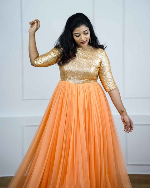 Pre-Order: Peach and Coral pink net gown with golden sequins yoke