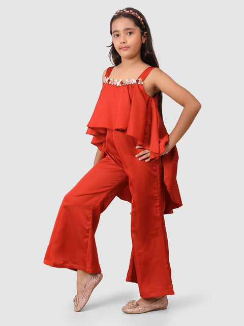 Asymetric jumpsuit with floral embelishment coral brown