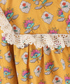 Flower motif print top with contrast lace along the yoke-Mustard