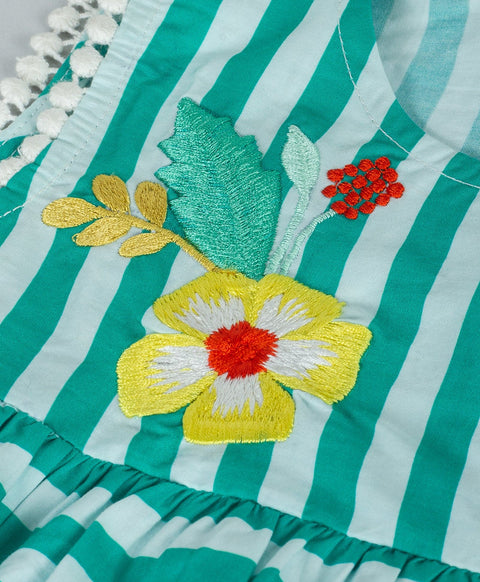 Stripe print top with yellow flower embroidery done at yoke n flounce end-Green