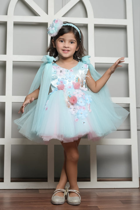 Pre-Order:  Blue Dress Embellished With Handmade Flowers And Shoulder Bow With Net Extension