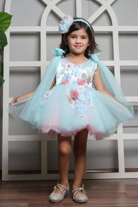 Pre-Order:  Blue Dress Embellished With Handmade Flowers And Shoulder Bow With Net Extension