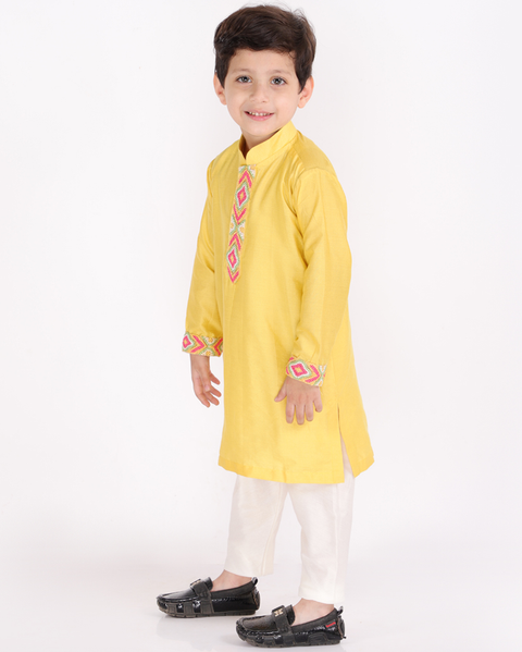 Pre-Order: Yellow knot Embroidered Kurta Churidar