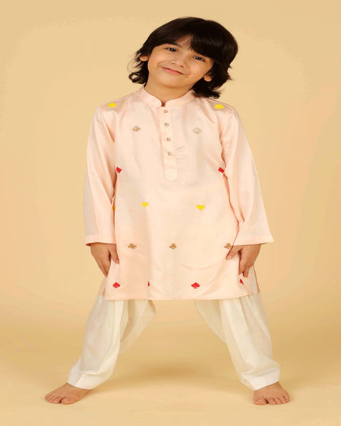 Pre-Order: Peach Kurta with All Over Embroidery and Salwar