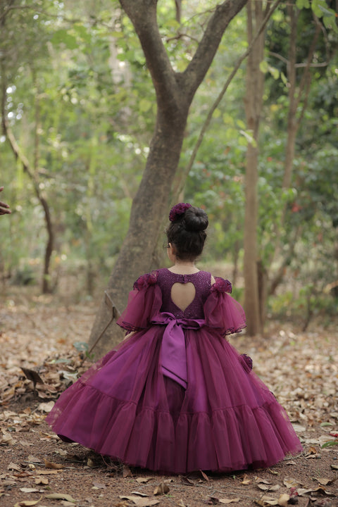 Pre-Order: Plum Purple Net Designer Gown With Frill Flower Detailing