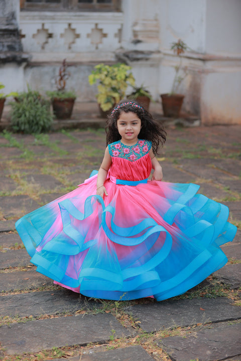 Pre-Order: Dry Rose And Sky Blue Double Shaded Twirled Partywear Gown With Hand Worked Yoke