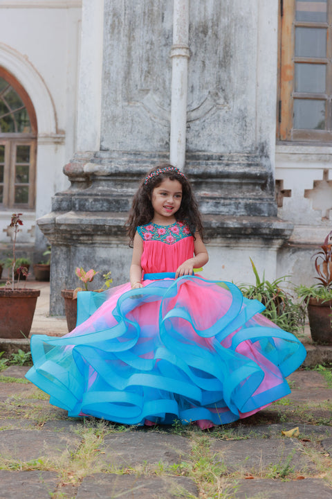Pre-Order: Dry Rose And Sky Blue Double Shaded Twirled Partywear Gown With Hand Worked Yoke