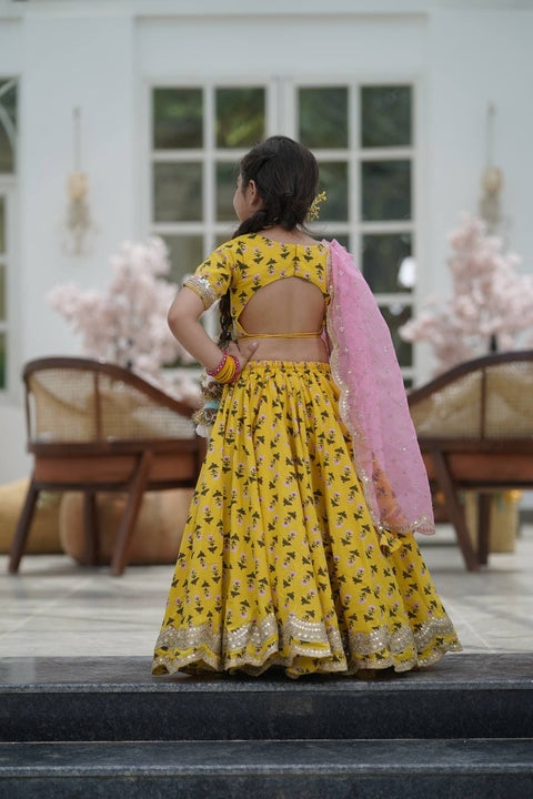 Pre Order: Yellow Printed Lehenga Choli and Organza Dupatta