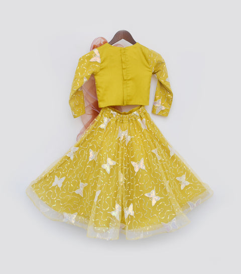 Pre Order: Mustard Yellow Butterfly Net Lehenga Choli with Orange Drape