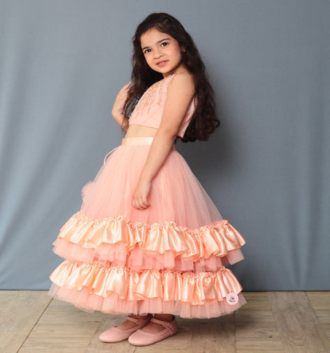 Pre-Order: One Shoulder Peach Lehenga Set Embellished with Tassel Lace