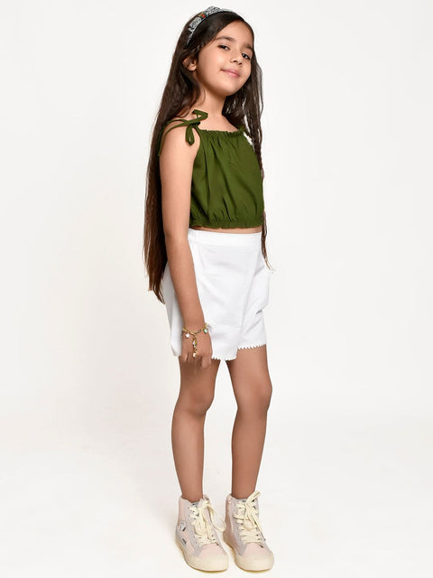 Green Flower embellished Top with  White Shorts