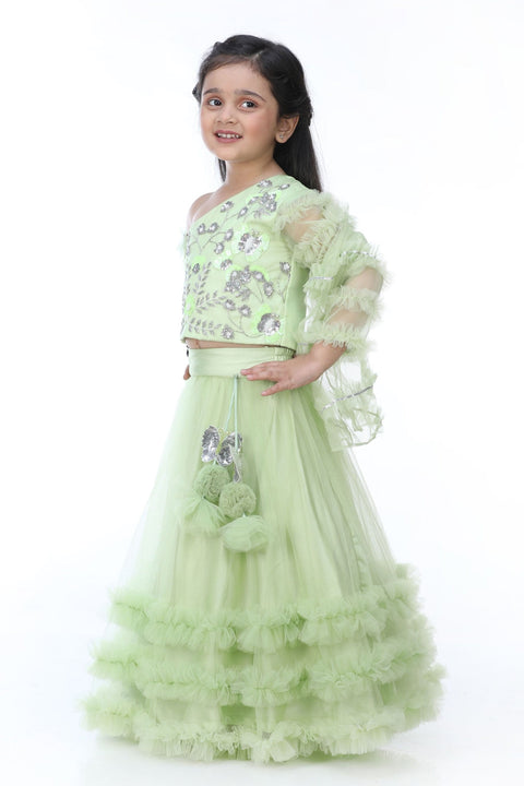 Pre-Order: Green One Shoulder Top With Frilly Lehenga And Dupatta