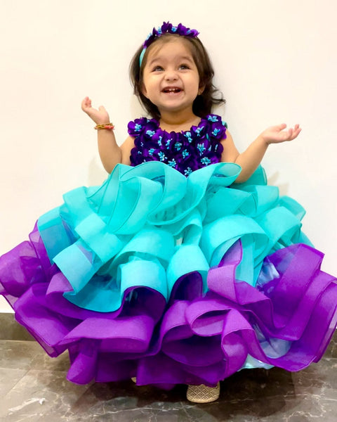 Pre-Order: Aqua Blue And Purple Gown With Fluffy Layered Netted Bottom And Hand-Crafted Purple Flowers