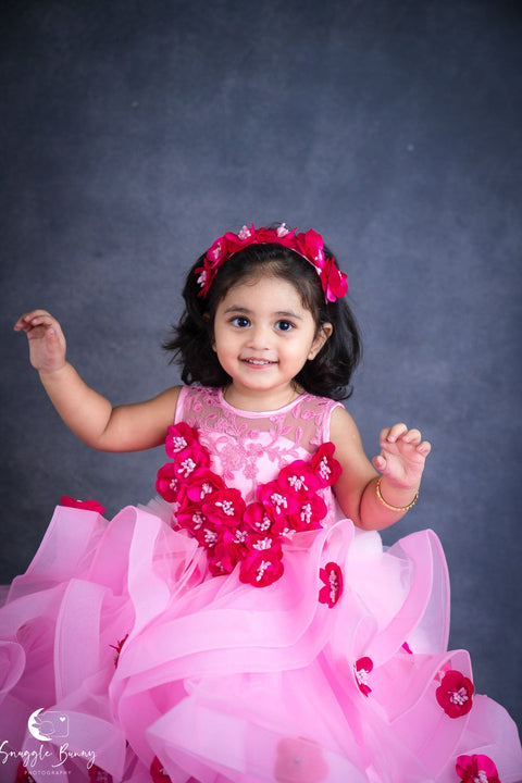 Pre-Order: Baby Pink Twirl Flouncy Gown With Frilled Layerd Trail On Back Side