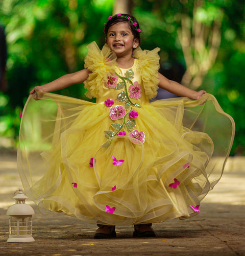 Pre-Order: Sunny Yellow Asymmetrical Swirl Gown With Fuchsia Pink Flower Appliqués