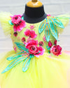 Pre-Order: Pale Yellow Twirled Gown With Pink And Greenish Blue Hand-Crafted Flower And Detailing