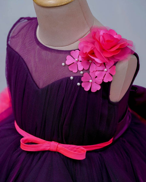 Pre-Order: Purple And Rani Pink Cloudy Frilled Party Wear Gown With Flower Detailing