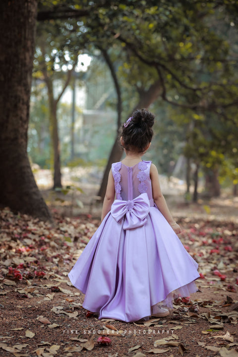 Pre-Order: Lavender Imported Quality Satin Gown With Designer Bow And Flower Applique Work