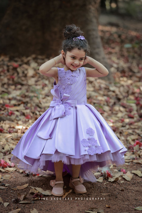 Pre-Order: Lavender Imported Quality Satin Gown With Designer Bow And Flower Applique Work
