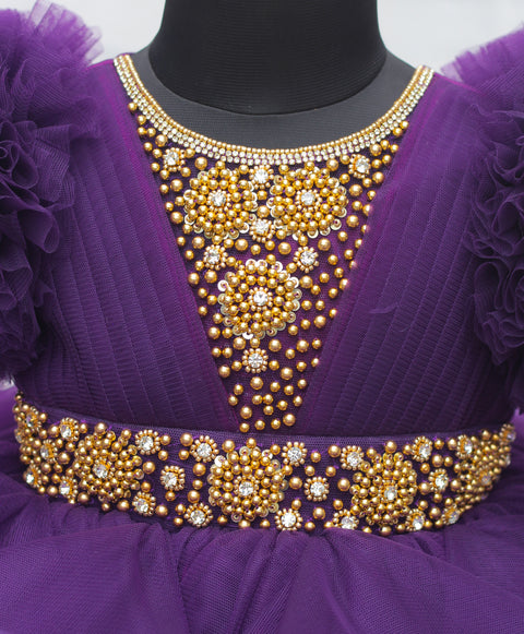 Pre-order: Dark grape purple twirled gown with rich golden bead work gown