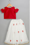 Red Cold-Shoulder Top with White Skirt