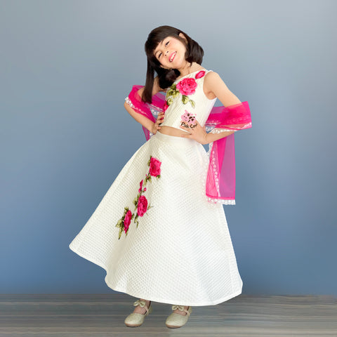 Pre-Order: One shoulder choli with hand embroidered rose appliqué with Lehenga and Dupatta