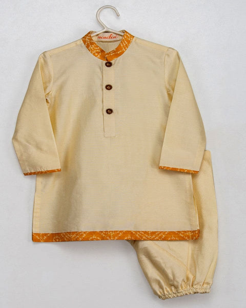 Pre-Order: Yellow Bandhej Jacket Set with a Brooch and Cream Kurta Churidar